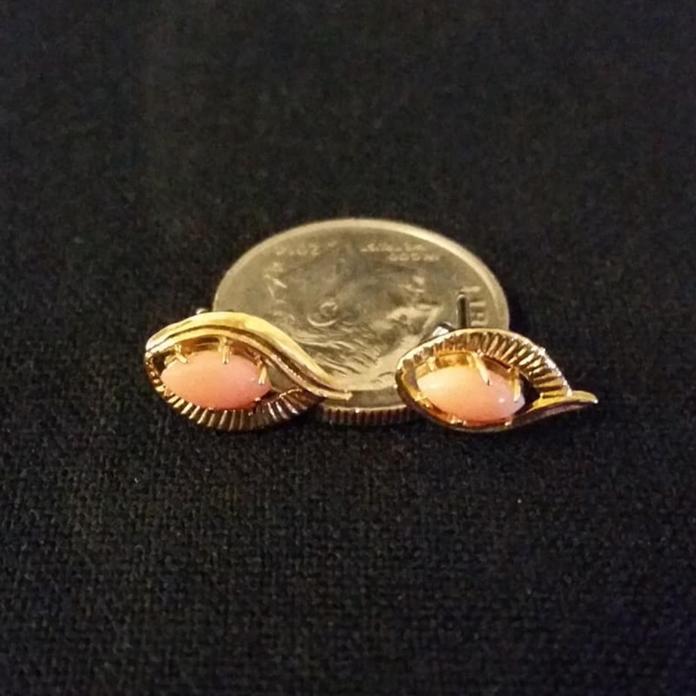 Coral colored and gold tone stud earrings